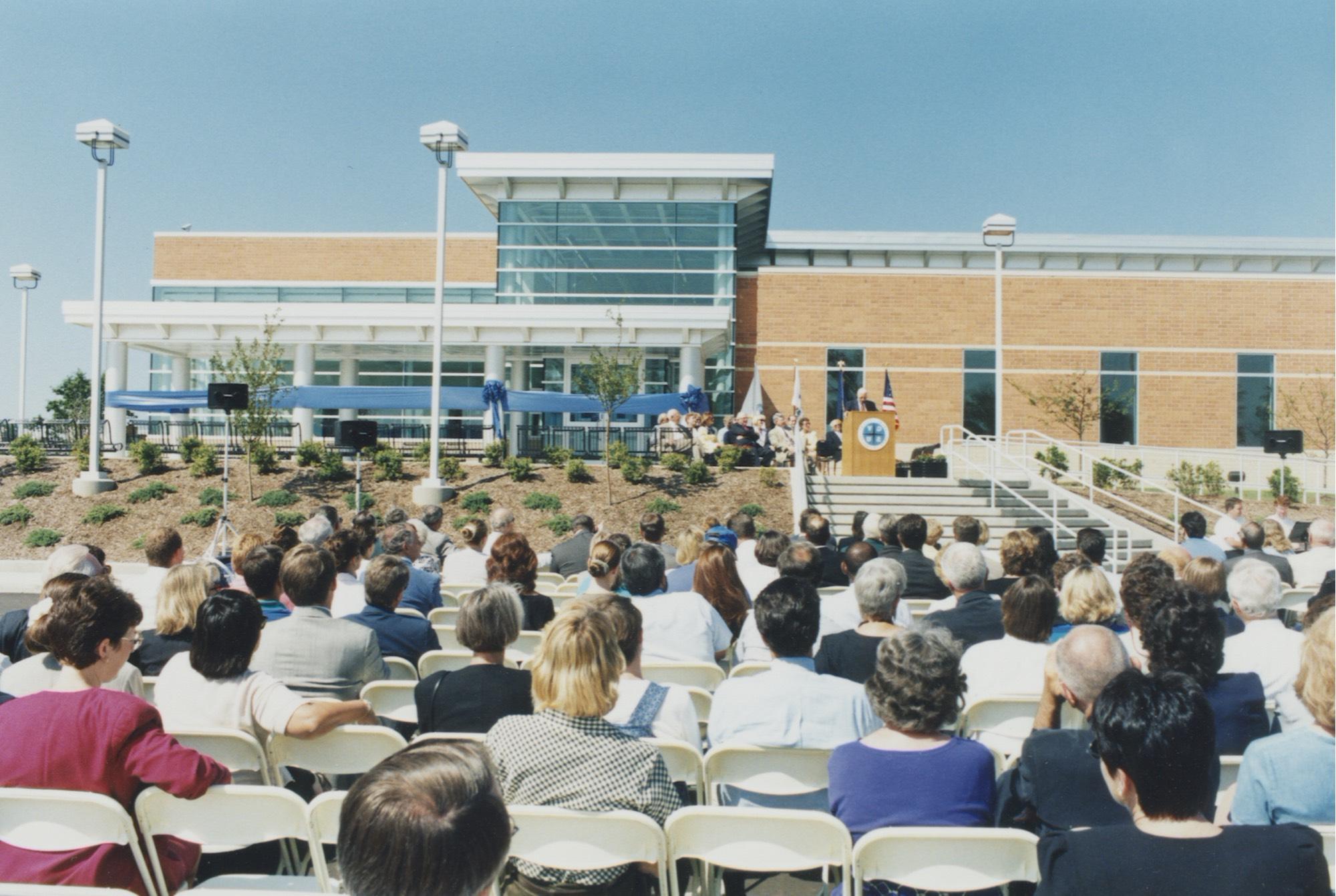 The Grand Valley State University Meijer Campus in Holland was dedicated in 1998. President Arend Lubbers is shown speaking at the podium during the ceremony.